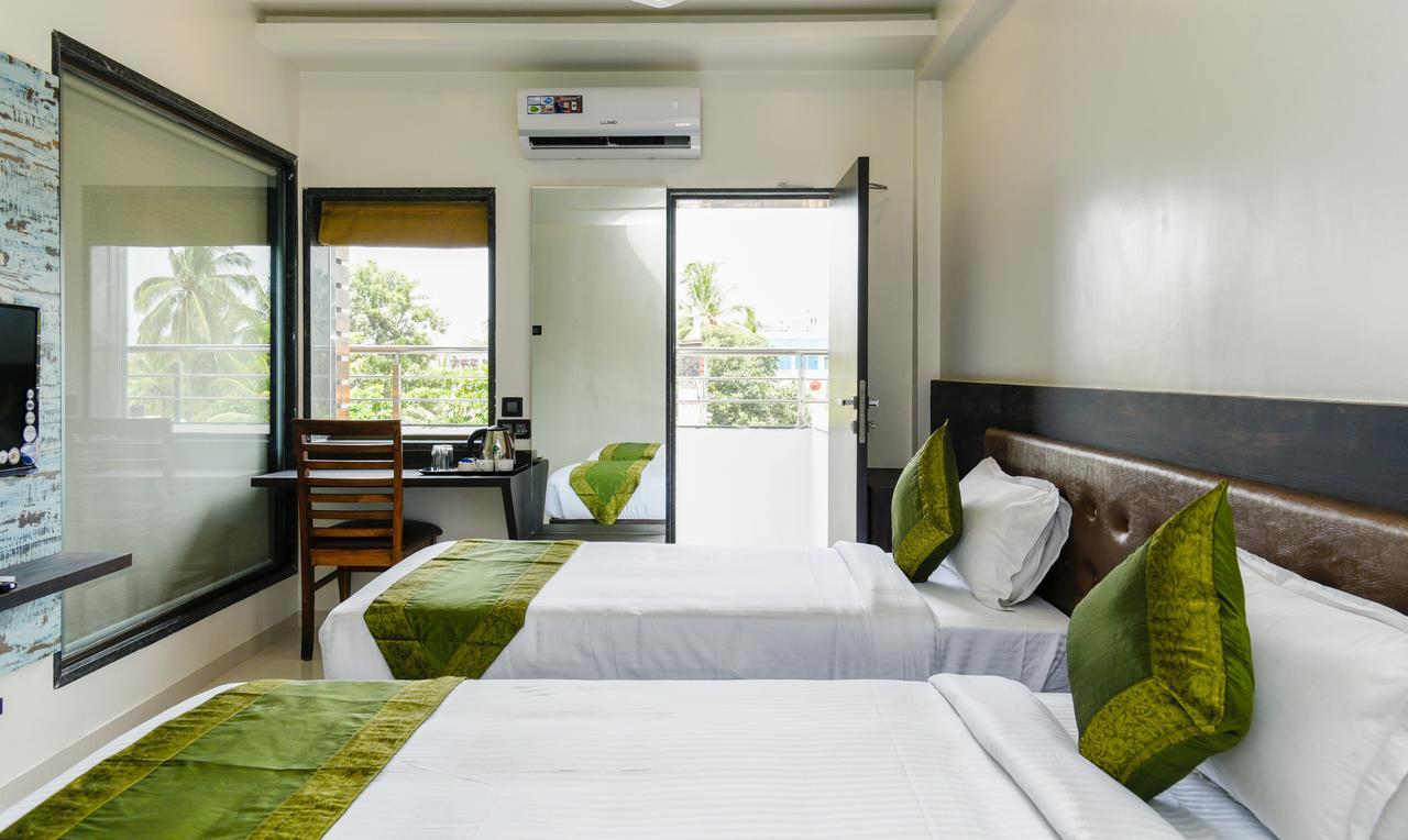 Treebo Malhaar Regency Hotel Chinchvad Exterior photo