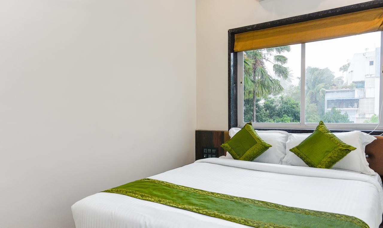 Treebo Malhaar Regency Hotel Chinchvad Exterior photo