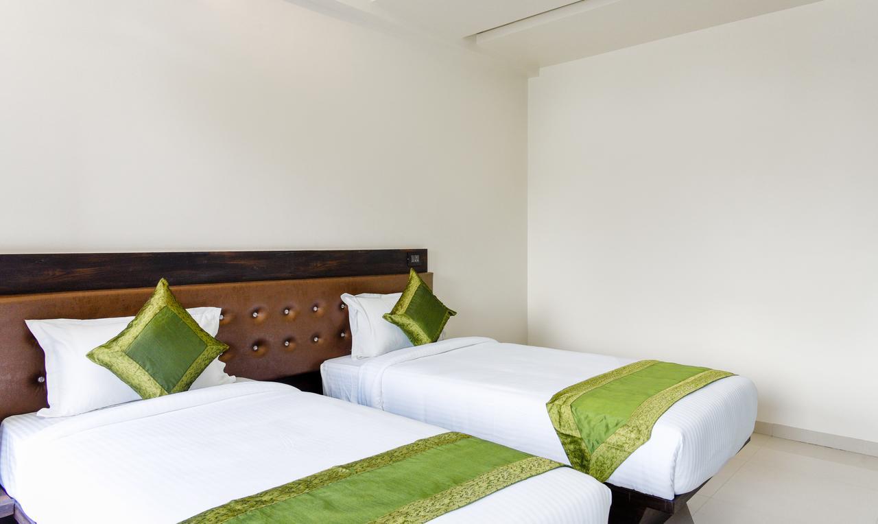 Treebo Malhaar Regency Hotel Chinchvad Exterior photo